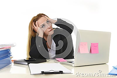 Worried attractive businesswoman in stress working with laptop c Stock Photo