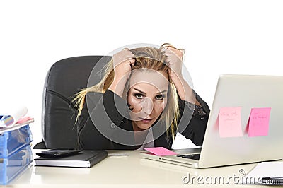 Worried attractive businesswoman in stress working with laptop c Stock Photo