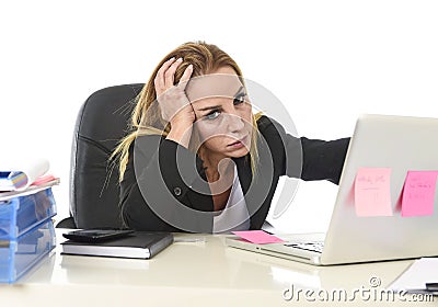 Worried attractive businesswoman in stress working with laptop c Stock Photo