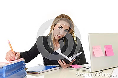 Worried busy attractive businesswoman in stress working with lap Stock Photo