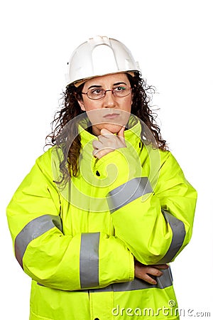 Worried female construction worker Stock Photo