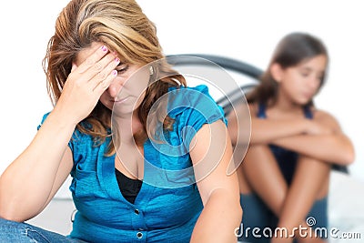 Worried mother with her troubled teen daughter Stock Photo