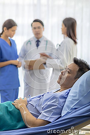 Worried patient in bed Stock Photo