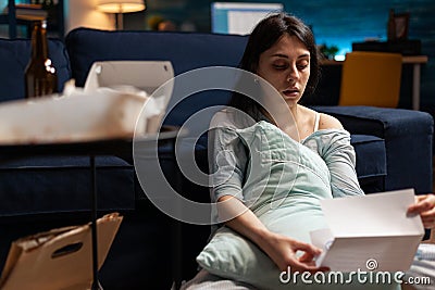 Worried person reading eviction notice message to pay mortgage Stock Photo