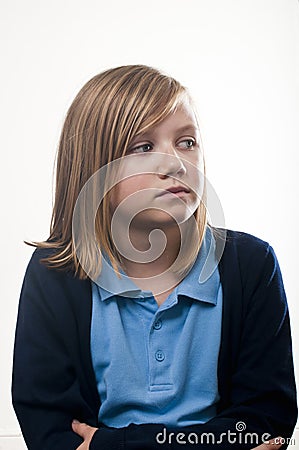 Worried school girl Stock Photo