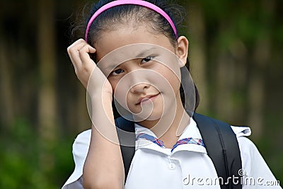 Worried School Girl With Books Stock Photo