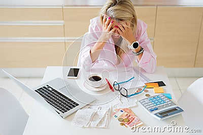 Worried housewife having money problems and bills to pay Stock Photo