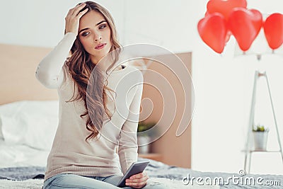 Worried young girl expressing sadness Stock Photo