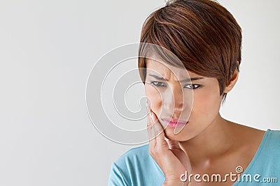 Worry woman with toothache, oral problem Stock Photo