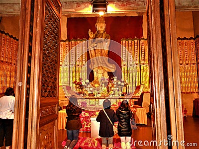 Worship and devotional life in China. Buddhism and art Editorial Stock Photo