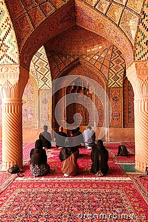 Worshipers praying in mosque, Isfahan, Iran Editorial Stock Photo