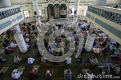 Worshippers attend Friday prayers at mosque as Palestinians ease the coronavirus disease COVID-19 restrictions Editorial Stock Photo