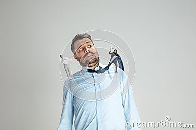 Human issues - angel and demon characters on adult man. Dark and light side of everyone. Stock Photo