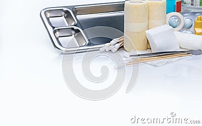 Wound care dressing set. Wound care equipment in hospital for nurse. Conform bandage, forceps, alcohol, cotton sticks, povidone- Stock Photo