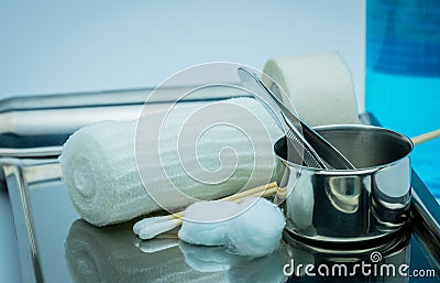 Wound care dressing set on stainless steel plate. Cotton ball wi Stock Photo