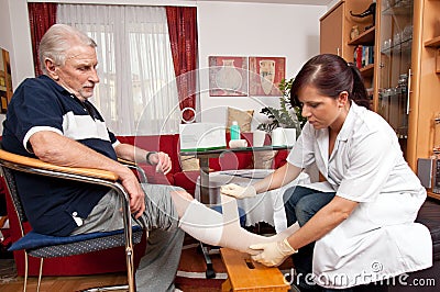 Wound care by nurses Stock Photo