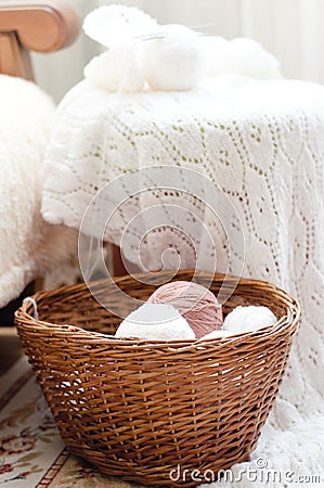 Woven hand made knitting and basket of clews Stock Photo