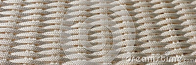 Woven panoramic light background. Simple background of bright ropes Stock Photo