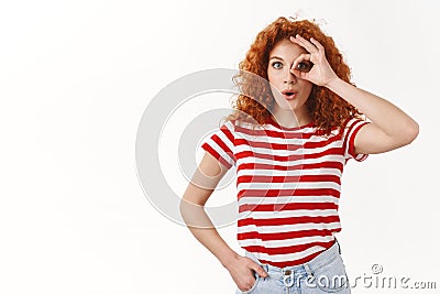 Wow fantastic prices. Good-looking fascinated impressed modern stylish curly redhead woman folding lips amused wide eyes Stock Photo