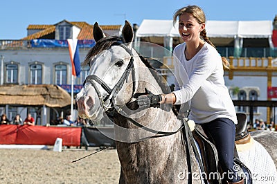 WOW Girl riding horse Stock Photo