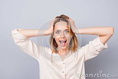 Wow! It`s unbelievable! Shocked happy woman with opened mouth to Stock Photo