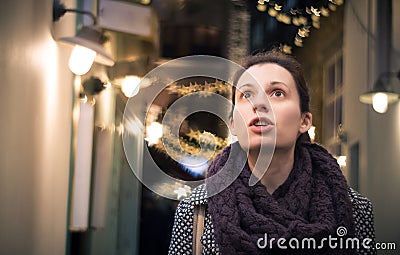 Wow! Woman amazed by Christmas decorations Stock Photo