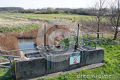 Flood control sluice used for water management Editorial Stock Photo