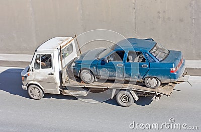 Wreck car carrier truck deliver damaged car Stock Photo