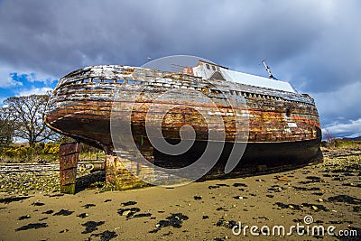 The wreck of a fishing trawler at Corpach near Fort William in the Highlands of Scotland Editorial Stock Photo