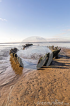 The wreck of the Norwegian ship SS Nornen which ran aground on the beach at Berrow near Burnham-on-Sea, UK in 1897 due Stock Photo