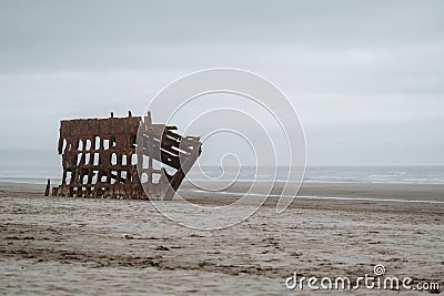 The Wreck of the Peter Iredale shipwreck on the Fort Stevens beach in Astoria, Oregon Stock Photo