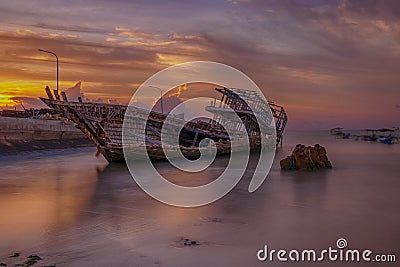 wrecked boat that sank on the beach Stock Photo