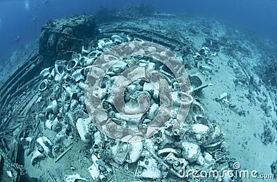 Wrecked remains of the cargo of a shipwreck. Stock Photo