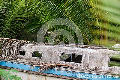 Wrecked and weathered hull of an abandoned sailboat Stock Photo