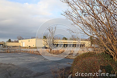 The GLIT plant now closed distant view of parked cars and buildings Editorial Stock Photo