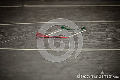 Wrestling mat and colored straps Stock Photo