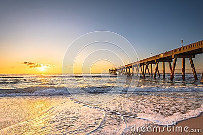 Johnnie Mercers Fishing Pier at sunrise in Wrightsville Beach east of Wilmington,North Carolina,United State. Stock Photo