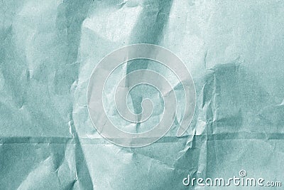 wrinckled cyan color paper surface. Stock Photo