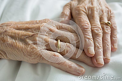 Wrinkled hands Stock Photo