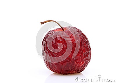 Wrinkled red apple Stock Photo