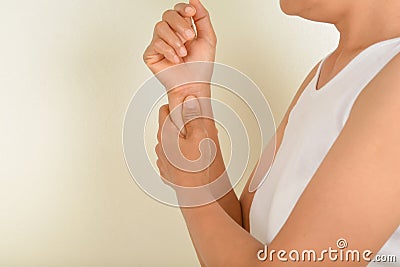 Wrist pain muscle strain in older women Stock Photo
