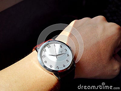 Wrist watch on hand Stock Photo