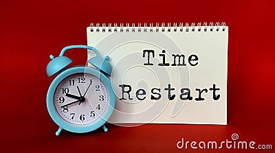 Write the restart time in White Notepad . Stock Photo