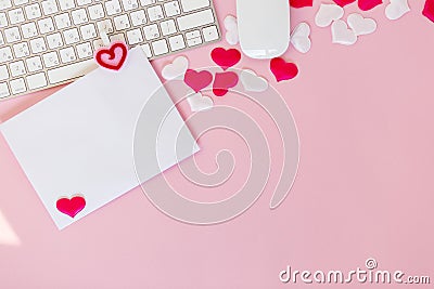 Write wish on white piece of paper for Valentines day on February 14. Celebrate Valentines day. Office flat lay with red toy Stock Photo