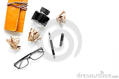 Writer acsessories. Glasses pen and crumpled paper on white background top view copyspace Stock Photo