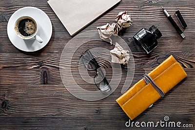 Writer acsessories. Vintage notebook, pen, crumpled paper and glasses on white background top view Stock Photo