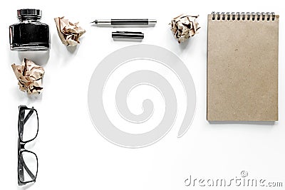 Writer concept. Glasses, pen and vintage notebook on white background top view mockup copyspace Stock Photo