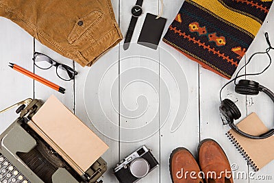 writer is going on a journey - typewriter, camera, clothes, glasses, watch Stock Photo