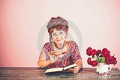 Writer and poet, granny read fairytale. Stock Photo