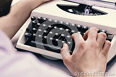 Writer typing with retro writing machine. Old typewriter Stock Photo